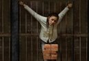 Картина, иллюстрирующая пытку подвешиванием на шею последовательницы Фалуньгун тяжёлых предметов
